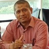 Dr. Aslim, S.S., M.Hum.